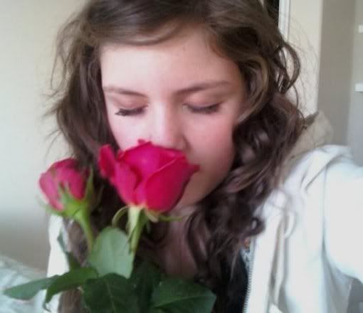 woman smelling roses photo: smelling roses like david me.jpg